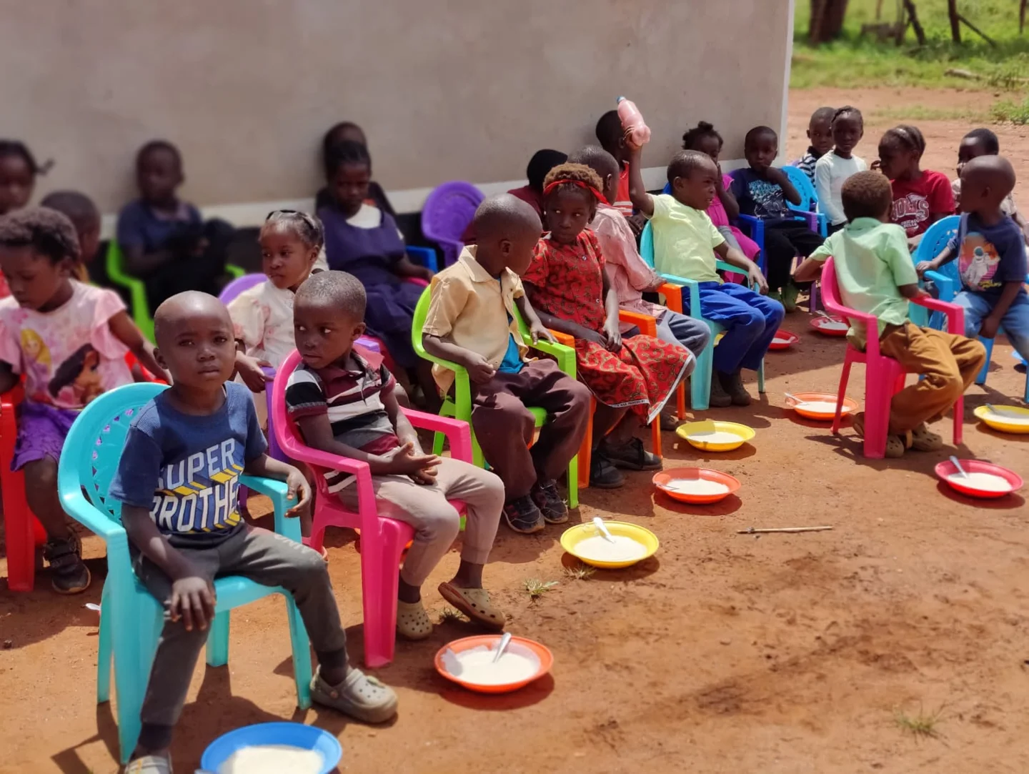 Academy children gathered for their school-day meal